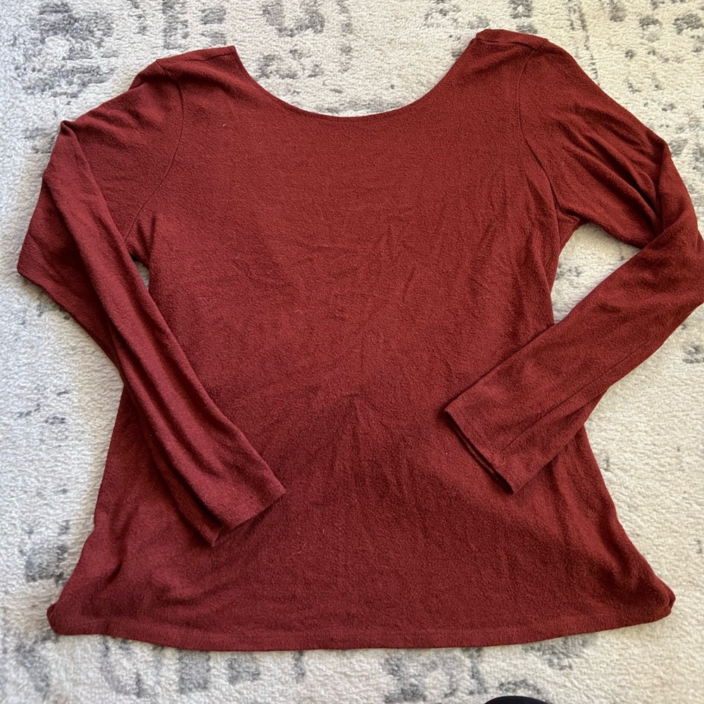 Women’s burnt orange long sleeve with cross back